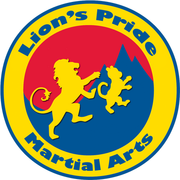 Logo for Lion's Pride Martial Arts, an adult lion and a cub are travelling up a mountain path together.  The adult lion is behind the cub, ready to assist it.